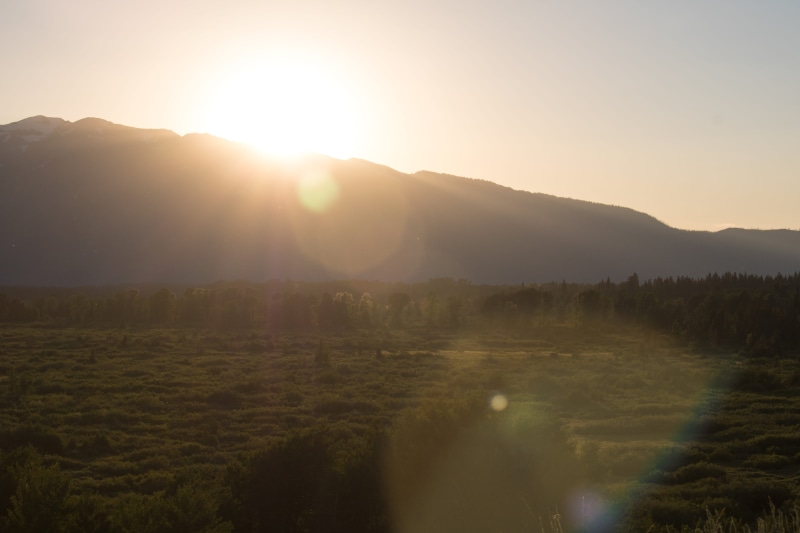 non-urban scene, sky, mountain, tranquility, bright, sunlight, tranquil scene, lens flare, sun, solar flare, beauty in nature, united states, no people
