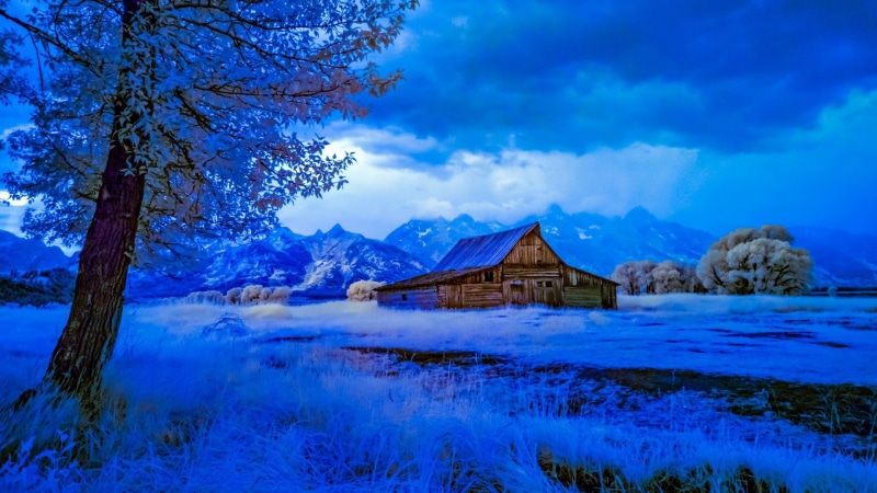 national park, tranquil scene, building, antelope flats, no people, sky, mountain range, freezing, architecture, cold temperature, wilderness, blue landscape
