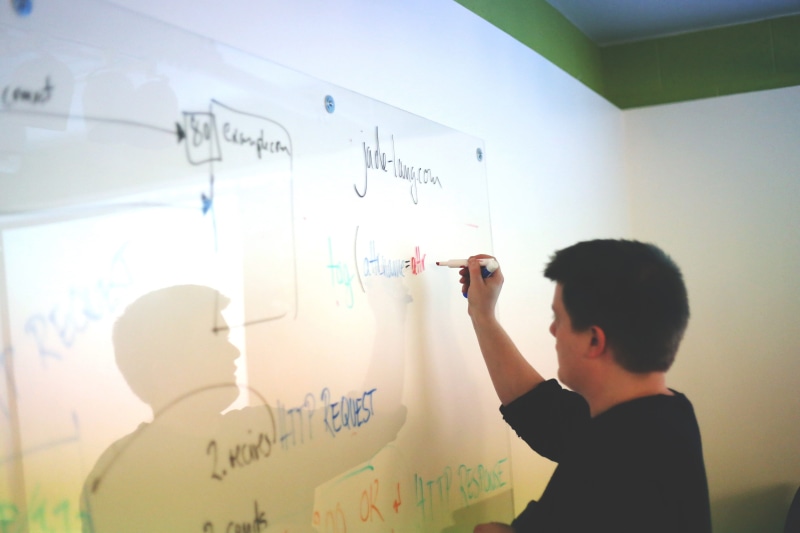 plan, one person, diagram, young adult, communication, guy, text, present, whiteboard, school, board, planning, adult, meeting, presentation, holding, show