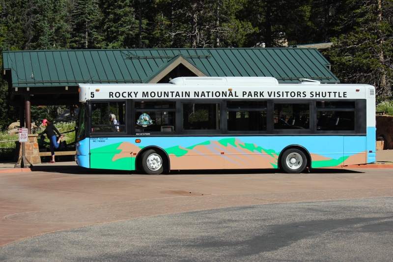 real people, shuttle bus, city, text, rocky, ecofriendly, truck, trail, tourism, architecture, green, nature, tree, hill, summer, national, mode of transportation