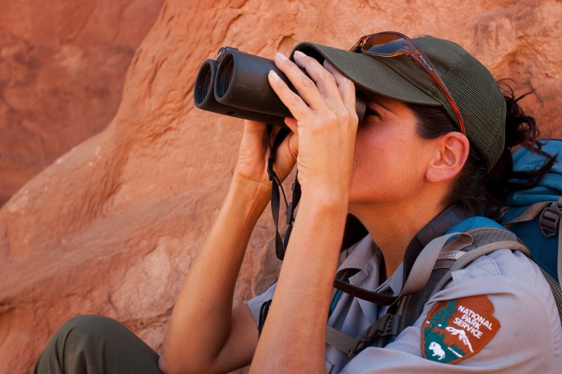 hat, technology, leisure activity, real people, day, young adult, park, side view, travel, ranger, service, headshot, lifestyles, portrait, official, kuhn