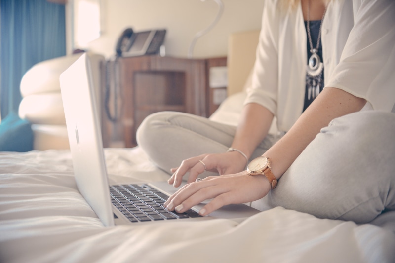 writer, adult, typing, traveling, wristwatch, sitting, furniture, technology, hotel, computer, people, blogger, browsing, wireless technology, woman, hand