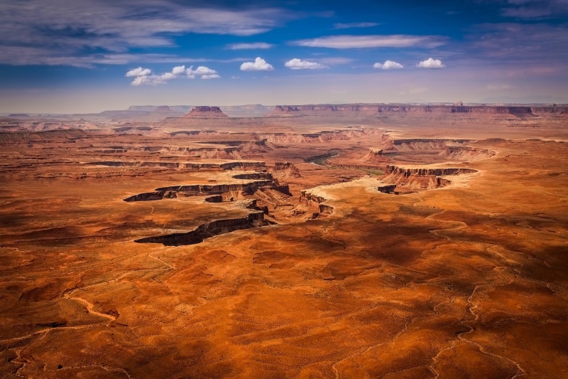 landscape, blue, scenics - nature, nature, non-urban scene, solid, travel, sandstone, scenic, eroded, clouds, desert, aerial, outdoors, photo, remote, mountains