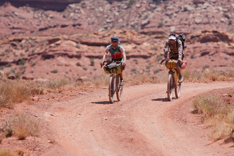 leisure activity, bicycle, canyonlands national park, desert, Cyclists, transportation, activity, day, scenic, spectacular, recreation, headwear, rock - object