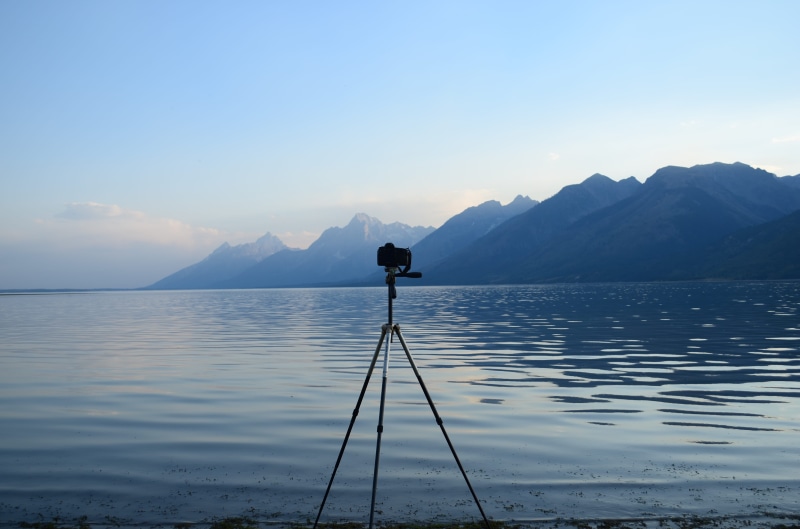 water, scenics - nature, standing, tranquil scene, rear view, national park, united states, lifestyles, 4K, one person, wy, mountain range, grand teton