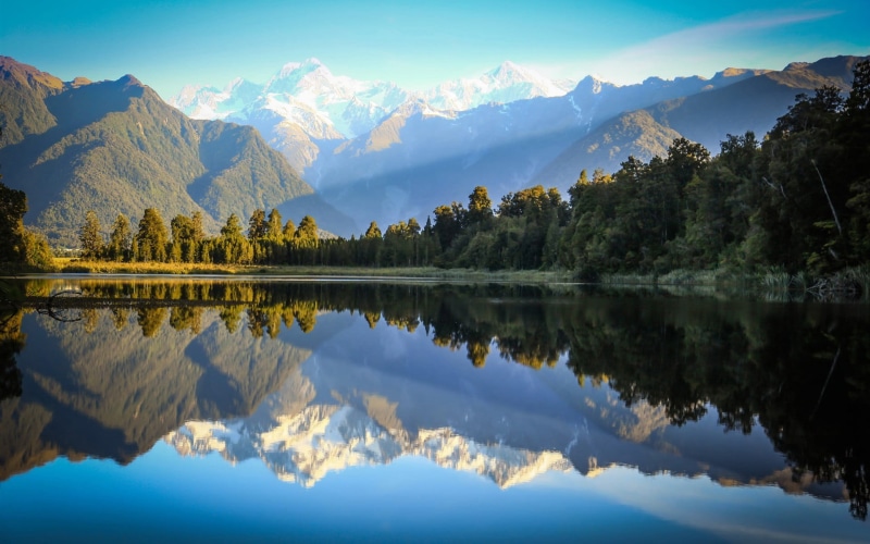plant, water, cloud - sky, mountain, forest, beauty in nature, symmetry, no people, daytime, New Zealand, landscape, snowcapped mountain, nature, mountain range