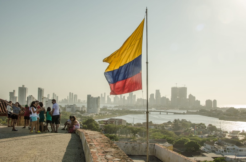 group of people, cityscape, nature, day, men, sky, cartagena, people, office building exterior, real people, outdoors, city, clear sky, skyscraper, crowd