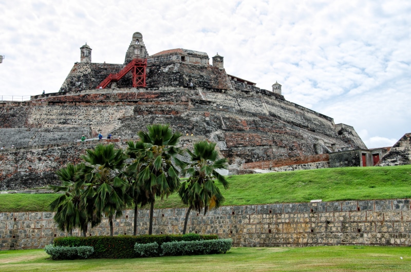 ancient civilization, ruined, palm trees, nature, castillo de san felipe, building exterior, day, outdoors, defense, Cartagena, sky, religion, architecture