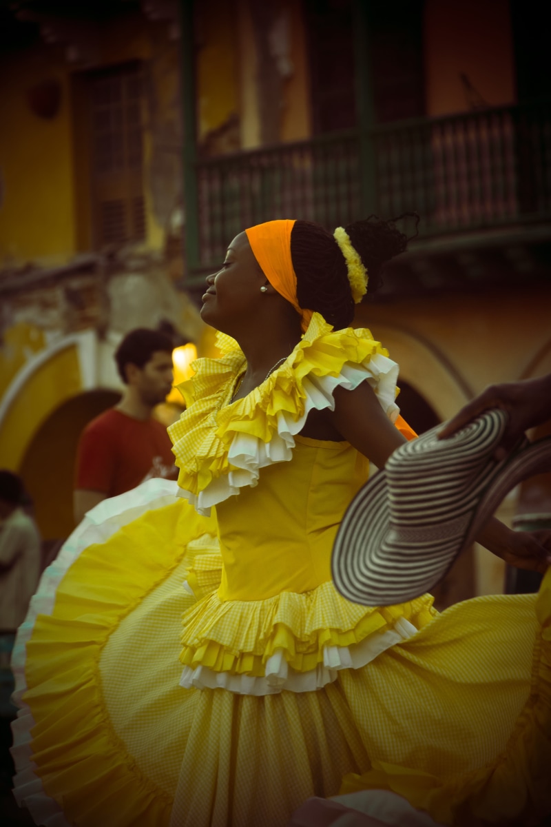 women, nature, dance, fragility, architecture, flowering plant, flower, freshness, lifestyles, holding, cumbia, plant, cartagena, yellow, focus on foreground