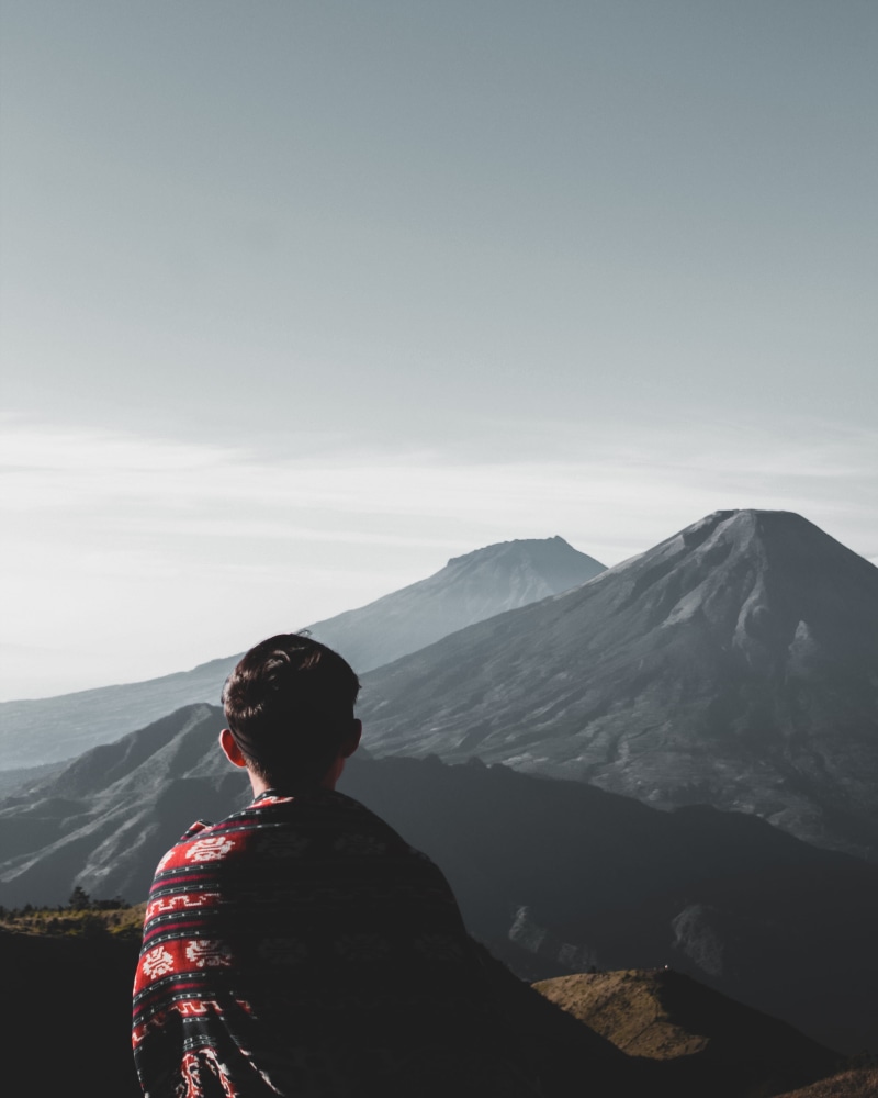 lifestyles, looking at view, fog, frosty, day, mountains, tranquil scene, environment, man, mountain range, adventure, scenics - nature, idyllic, one person