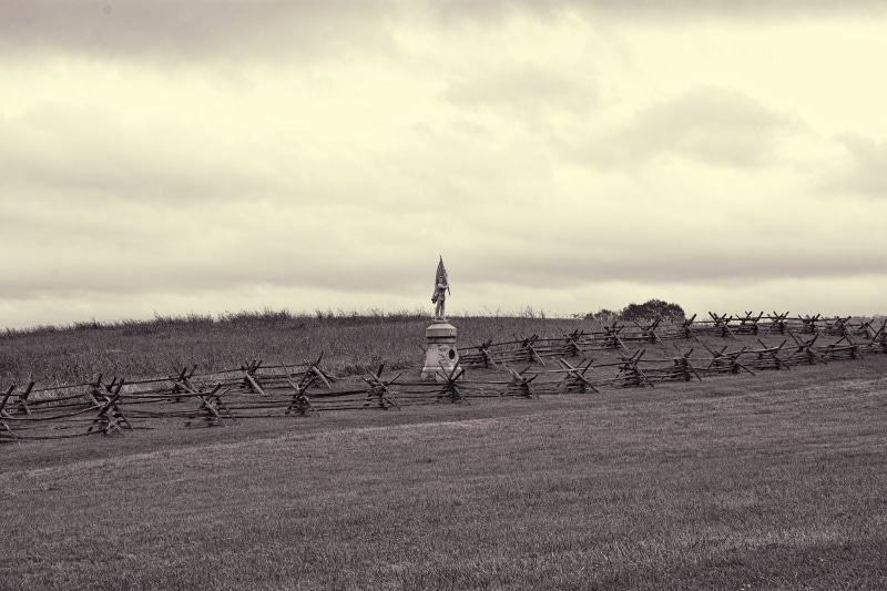 plant, one person, historic, tranquil scene, sky, monument, pennsylvania, us, battle, battlefield, land, history, rear view, day, gettysburg, field, grass