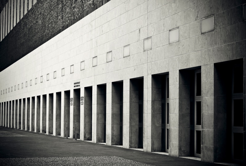 pattern, wall - building feature, black-and-white, black, in a row, modern, no people, building exterior, construction, footpath, concrete, architectural column