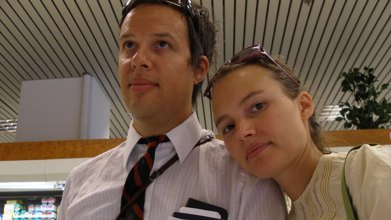 white, the dead texan, real people, men, s, shirt, 1080P, two people, indoors, communication, glasses, man, pre-adolescent child, necktie, women, looking at camera
