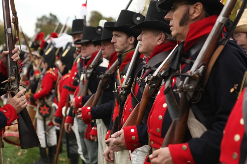uniform, lining, 5K, clothing, outdoors, conflict, arts culture and entertainment, military uniform, real people, civil, musical instrument, day, group