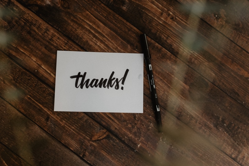 text, communication, thoughtful, wood, western script, thank you, calligraphy, write, sign, pen, hand, high angle view, capital letter, still life, 5K