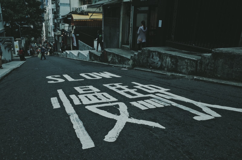 hongkong, 4K, day, one person, built structure, chinese, outdoors, written, direction, incidental people, slow, communication, road, black, transportation