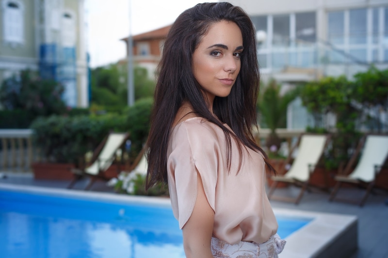 face, Victor Kalman, brown hair, standing, real people, beauty, lifestyles, young adult, architecture, teenager, swimming pool, looking at camera, hair