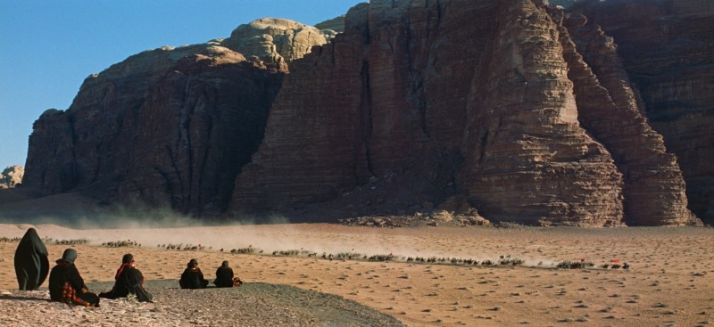 beach, men, rock - object, water, solid, day, lawrence of arabia, mountain, group of people, leisure activity, real people, scenics - nature, rock, beauty in nature