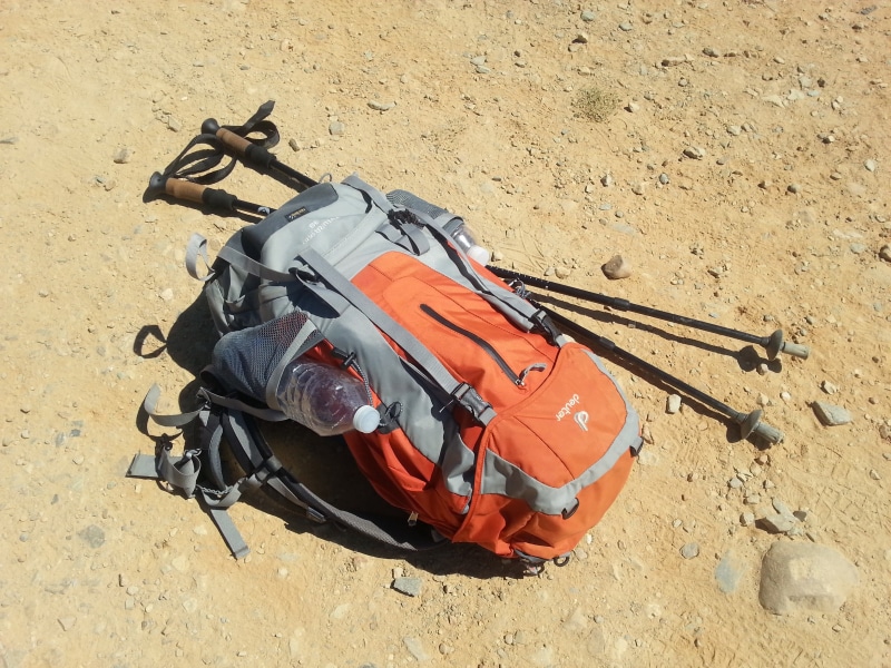 field, no people, outdoors, beside, camino de santiago, equipment, bag, wanderer, jakobsweg, sunlight, orange color, hiking poles, ground, security, beach