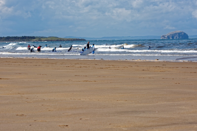 motion, adults, sport, sand, leisure activity, sea, scottish, scotland, surfboards, female, nature, outdoors, wave, shoreline, firth of forth, surf school