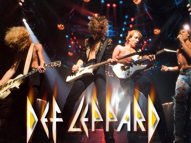 artist, pop musician, stage, electric guitar, string instrument, playing, bass guitar, group of people, Hard Rock, stage - performance space, Band (Music)