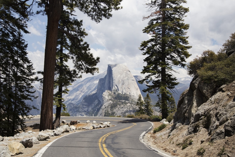 symbol, glacier point, half dome, landmark, snow, road, cloud - sky, tranquil scene, explore, tree, sign, diminishing perspective, mountain, scenics - nature