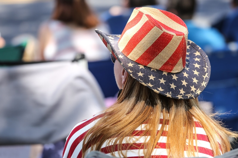 woman, flag, young adult, hat, clothing, people, hairstyle, stars and stripes, women, one person, 4th of july, independence, focus on foreground, casual clothing