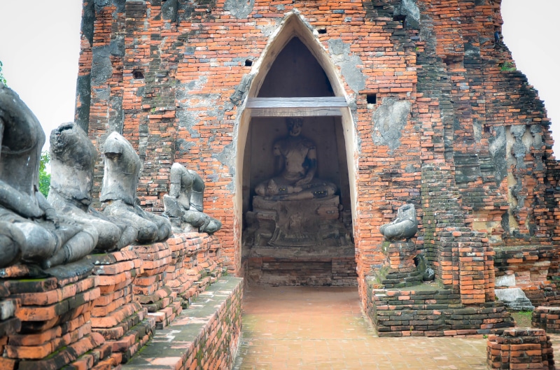 male likeness, worship, spiritual, decorative, spirituality, building exterior, human representation, tourism, buddha, meditation, art, culture, face, holy