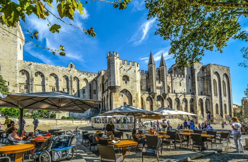 sidewalk cafe, palace du pape, french, historic, Tourism, large group of people, avignon, spirituality, architecture, outdoors, Castle, building, travel destinations