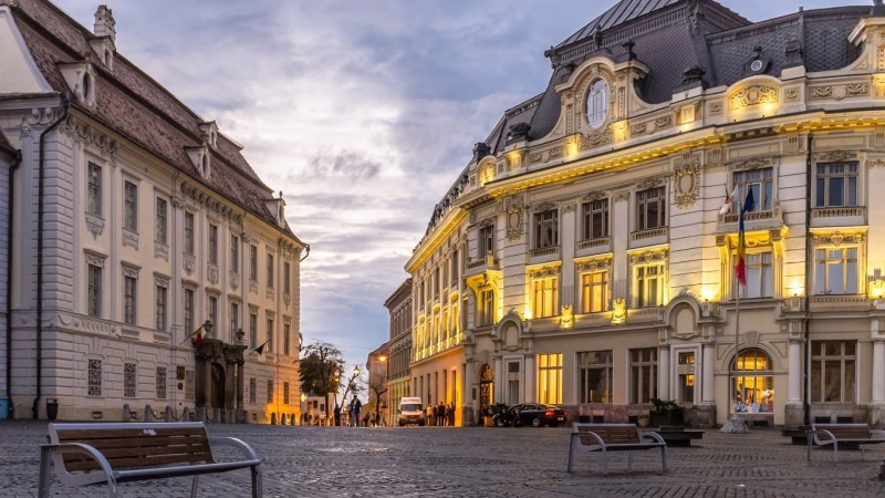 Romania, building exterior, window, city life, transportation, built structure, street, table, Man Made, sky, residential district, incidental people, Cityscape