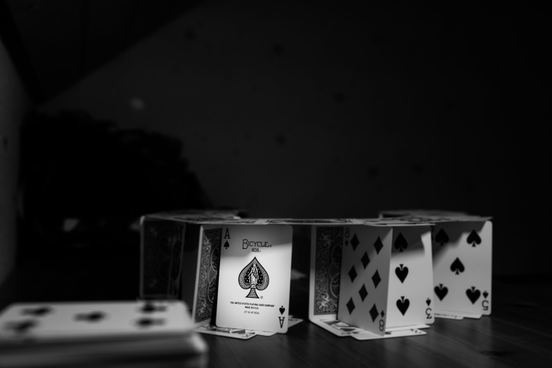 still life, 5K, leisure games, selective focus, wall - building feature, table, opportunity, arrangement, no people, playing cards, house of cards, number