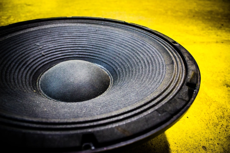 bass, focus on foreground, subwoofer, technology, hip hop, photo, steel, modern, circle, high angle view, tire, 2K, metal, design, close-up, no people