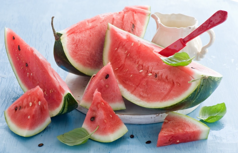 slice, ripe, melons, cross section, red, table, indoors, juicy, still life, citrus fruit, food and drink, melon, wellbeing, food, freshness, watermelon
