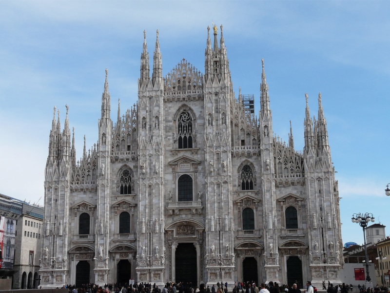 travel destinations, incidental people, place of worship, travel, italy, spirituality, built structure, outdoors, day, arch, building, tourism, sky, nature