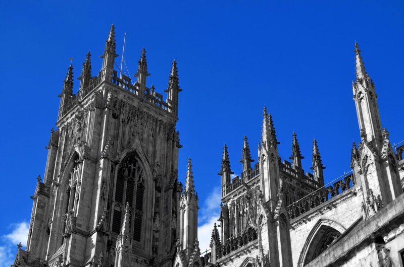 tower, low angle view, gothic Style, sky blue, built Structure, architecture And Buildings, York, place of worship, City, the past, belief, ornate, famous Place