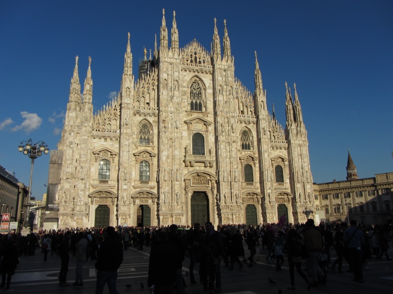 travel destinations, women, crowd, milan, italy, building, brown, gothic style, architecture, outdoors, duomo, monument, real people, daytime, the past