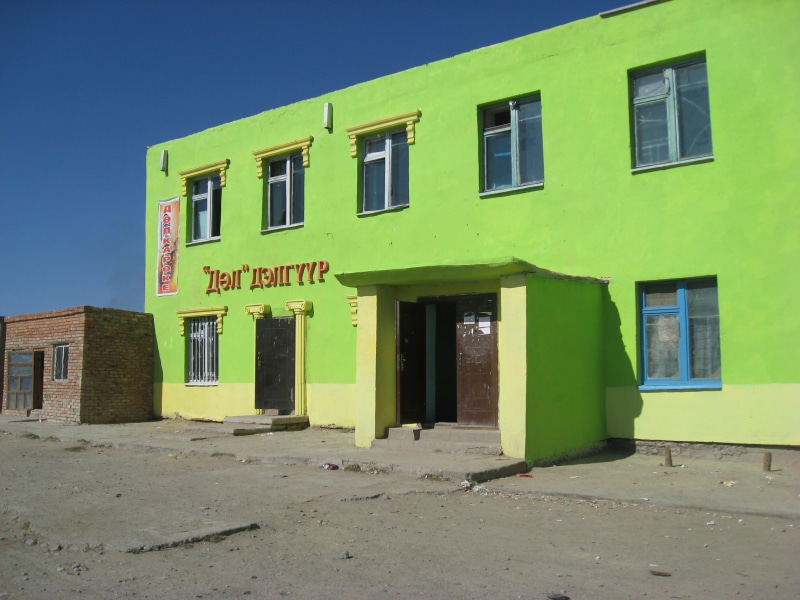 architecture, communication, entrance, western script, window, house, built structure, mongolia, door, green color, day, text, no people, building exterior