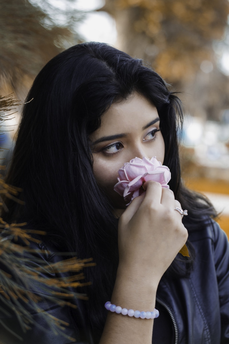 female, young adult, long hair, hairstyle, one person, flower, blossom, ring, front view, human, person, face, lady, beautiful woman, headshot, warm clothing