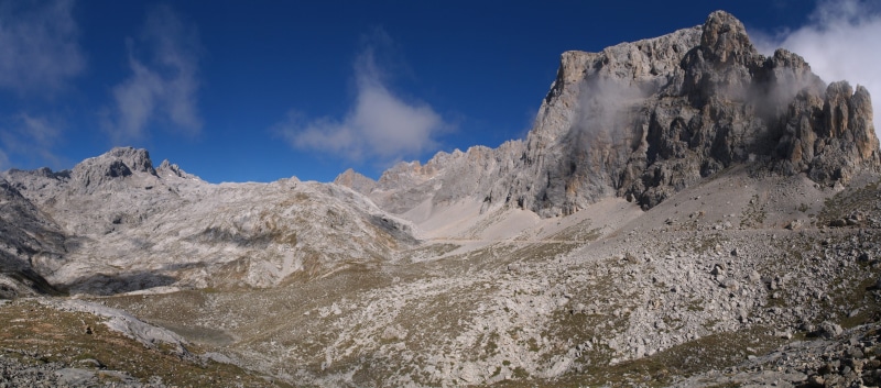 outdoors, coniferous tree, spain, beauty in nature, land, picos de europa, extreme terrain, scenics - nature, activity, sky, pine tree, rock - object, landscape