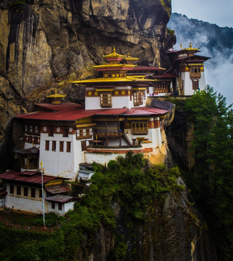 travel destinations, no people, hills, architecture, tree, building, nature, building exterior, shrine, built structure, belief, spirituality, tiger nest
