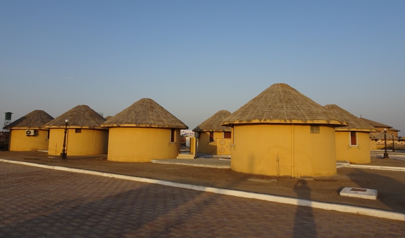 day, india, ecology, traditional, copy space, residential, road, built structure, thatch, clear sky, hut, gujarat, architecture, transportation, rural