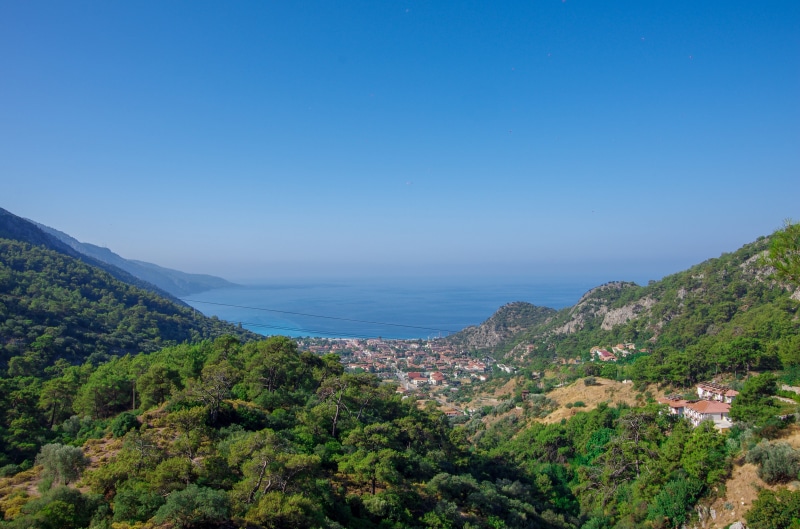 no people, landscape, non-urban scene, blue, tranquility, mountain, turkey, sky, land, marine, silhouette, beauty in nature, day, tourism, beach, mugla