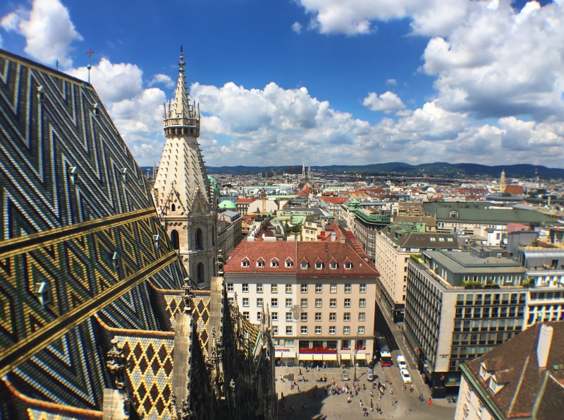 architecture, building exterior, 2K, europe, building, city, spire, outdoors, austria, travel, high angle view, tower, tourism, cloud - sky, built structure