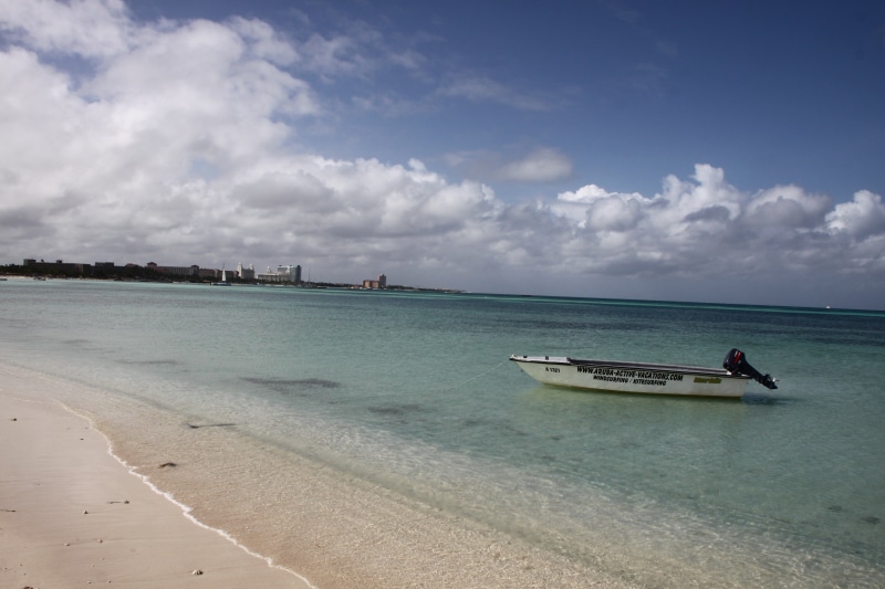 sand, people, land, cloud - sky, sea, nature, beach, nautical vessel, mode of transportation, day, horizon over water, aruba, real people, lesser antilles