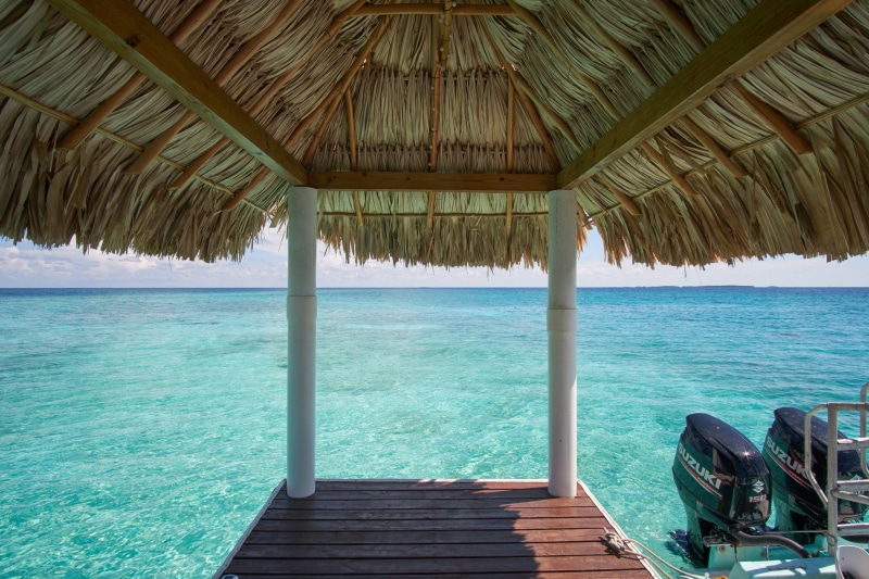 horizon over water, day, trip, idyllic, palapa, outdoors, dock, water, nature, beach, tranquil scene, sky, sea, turquoise colored, architecture, no people