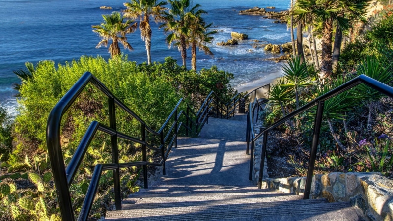 coast, sunlight, sea, estate, the way forward, stairs, sky, beach, architecture, orange county, beauty in nature, water, plant, ocean, tranquility, usa