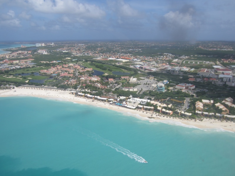 caribbean, netherlands antilles, sea, nature, no people, cityscape, outdoors, beach, helicopter, flight, aerial view, building, transportation, blue, building exterior