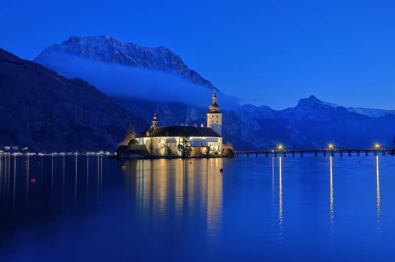 mountain range, blue, nature, Austria, Alps, outdoors, lake Traunsee, reflection, scenics - nature, building, dusk, snowcapped mountain, water, body, illuminated