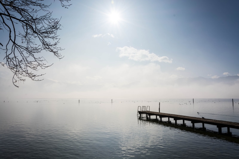 no people, sunlight, 5K, beauty in nature, alpine, non-urban scene, sun, mirroring, quiet, horizon, lake, water, bright, sky, cold, light, bridge, idyllic
