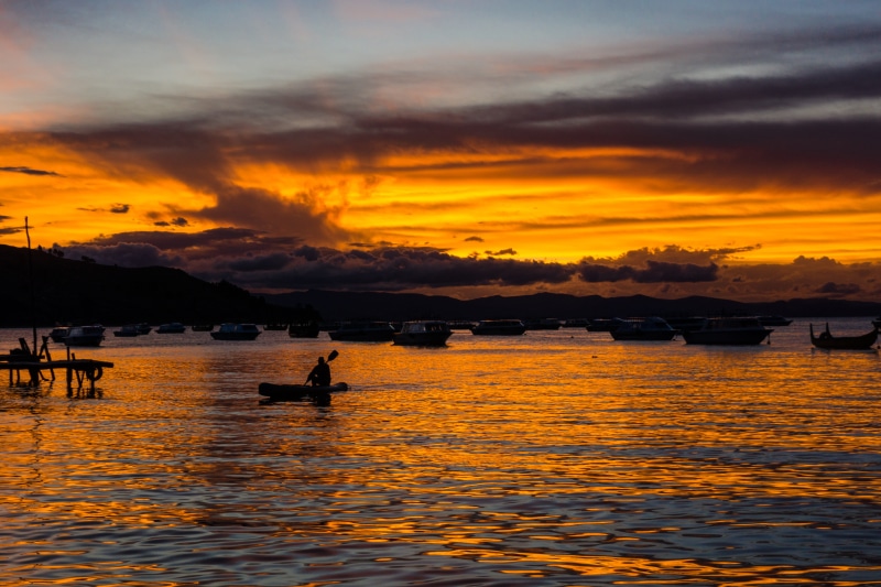 transportation, silhouette, sky, dusk, idyllic, beauty in nature, sunlight, bolivia, human, 5K, riding, red sky, nature, watercraft, tranquility, sunset